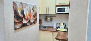 Гостиница  Гостиница Парк Отель Севастополь Четырехместный семейный номер с двумя зонами отдыха спальня и гостиная-11